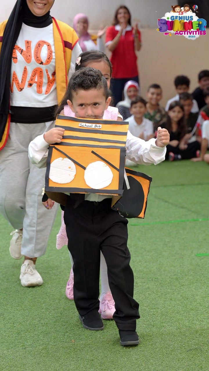 Child wearing a handmade costume at summer camp