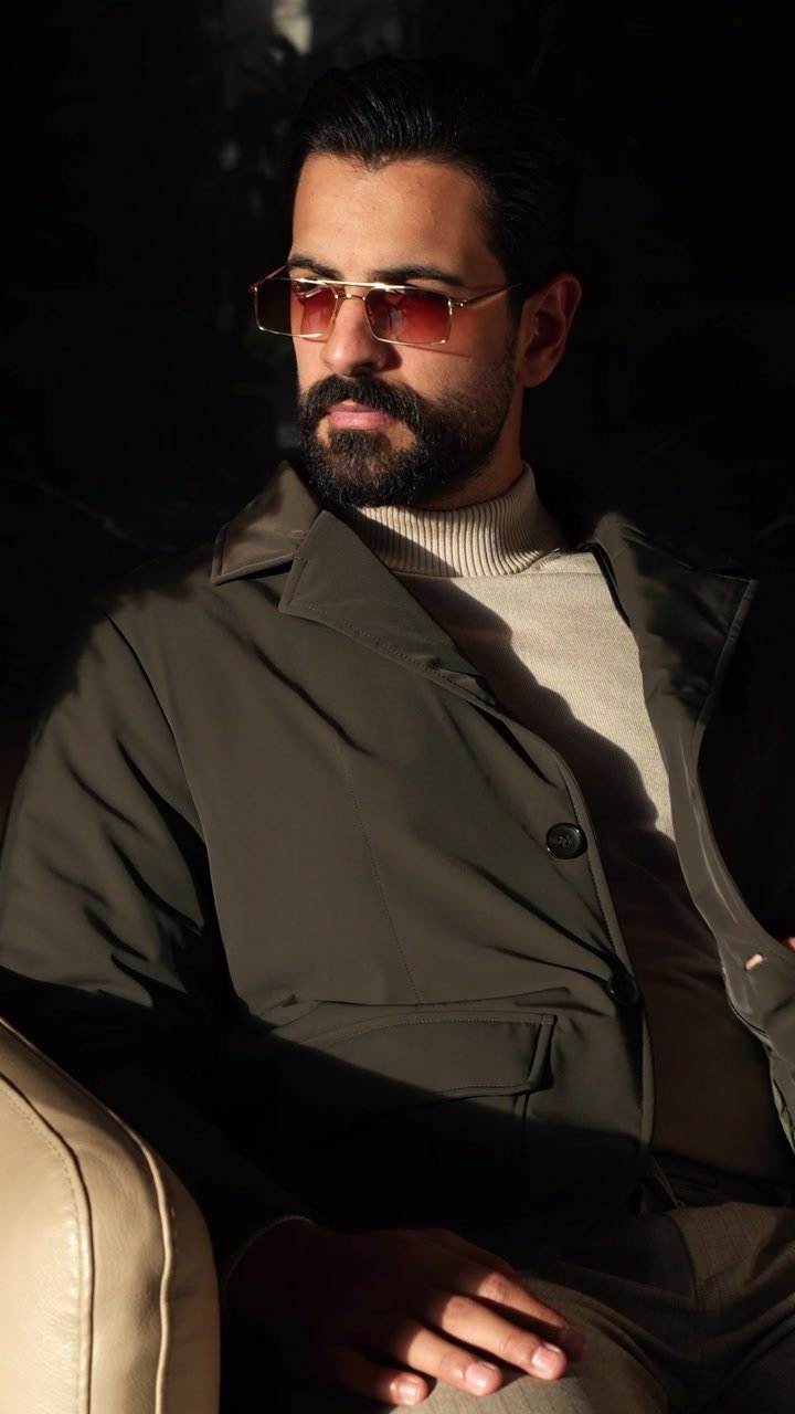 Tailored suit in dramatic indoor light